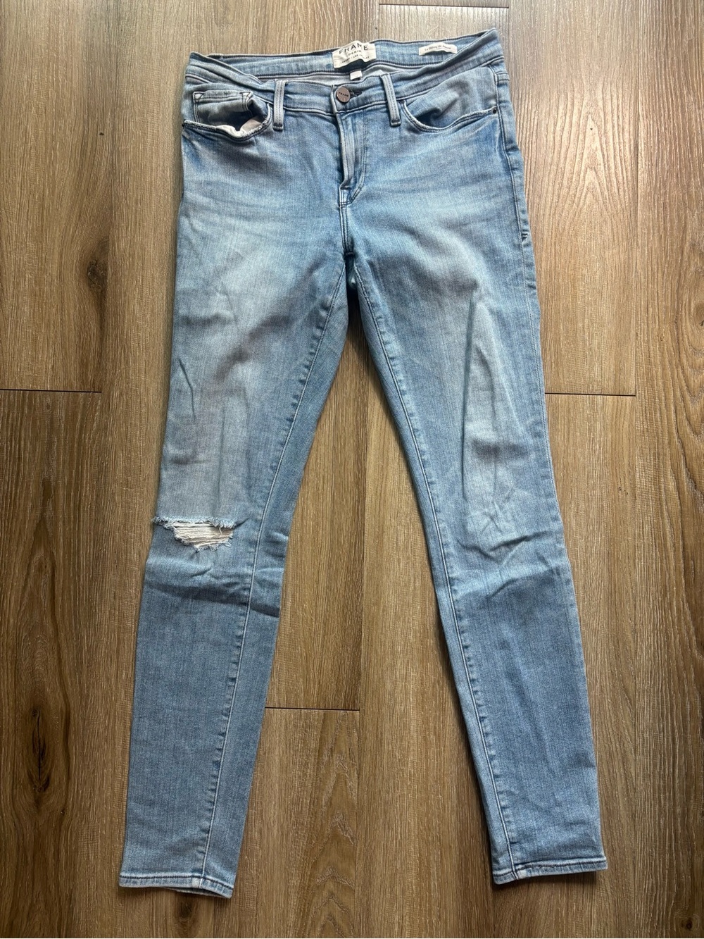Frame Denim Light Blue Skinny Jeans with Knee Distress